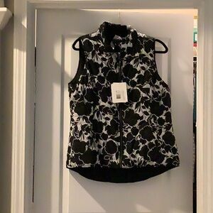 Jockey Sport reversible puffer vest. Color: Black and Black print Size: Large
